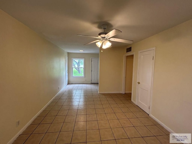 2301 E Monroe St, Harlingen, TX 78550 - empty room featuring ceiling fan and light tile patterned floors