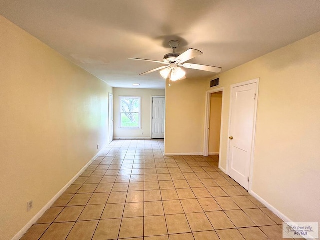 2301 E Monroe St, Harlingen, TX 78550 - spare room featuring a ceiling fan and light tile patterned floors