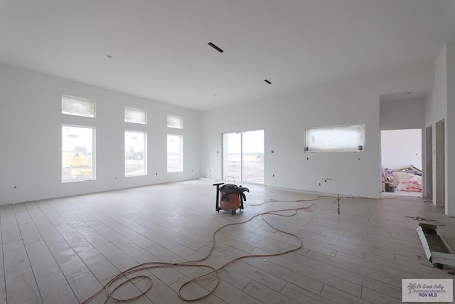 spare room with light wood-type flooring