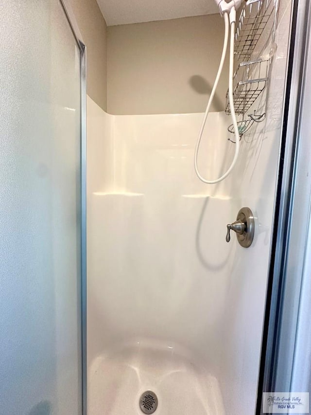 bathroom with walk in shower