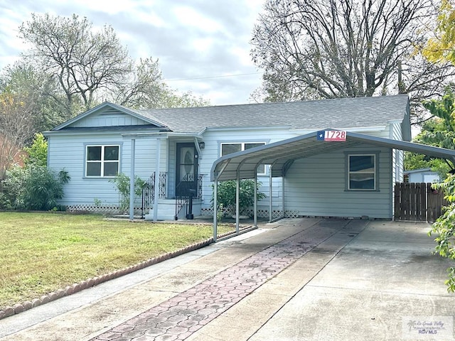 single story home featuring a front yard