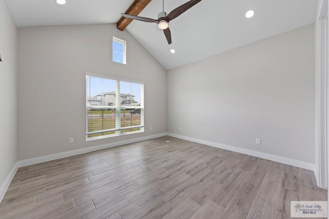 unfurnished room featuring baseboards, light wood-type flooring, ceiling fan, and beam ceiling