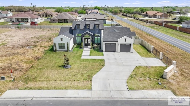 drone / aerial view with a residential view