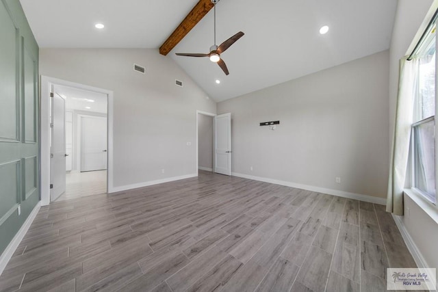 interior space with visible vents, high vaulted ceiling, light wood-style floors, and beam ceiling
