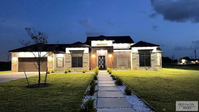 view of front facade with a front lawn