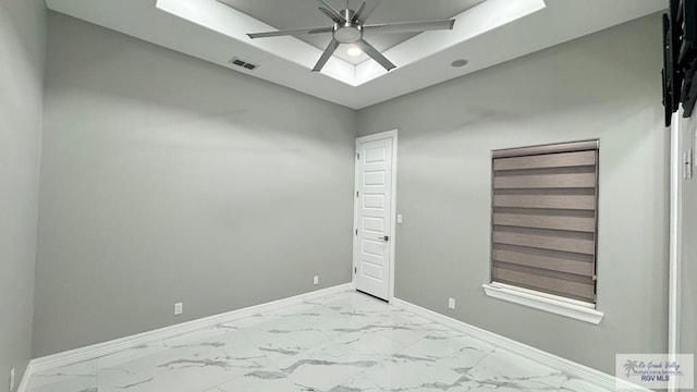 spare room featuring ceiling fan