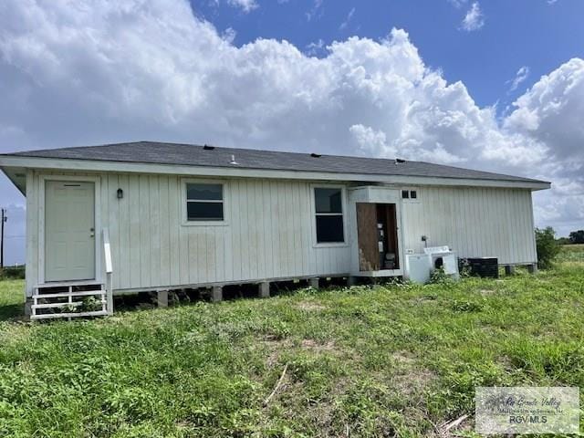 1056 E Mile 11, Weslaco, TX 78599 - rear view of house featuring entry steps