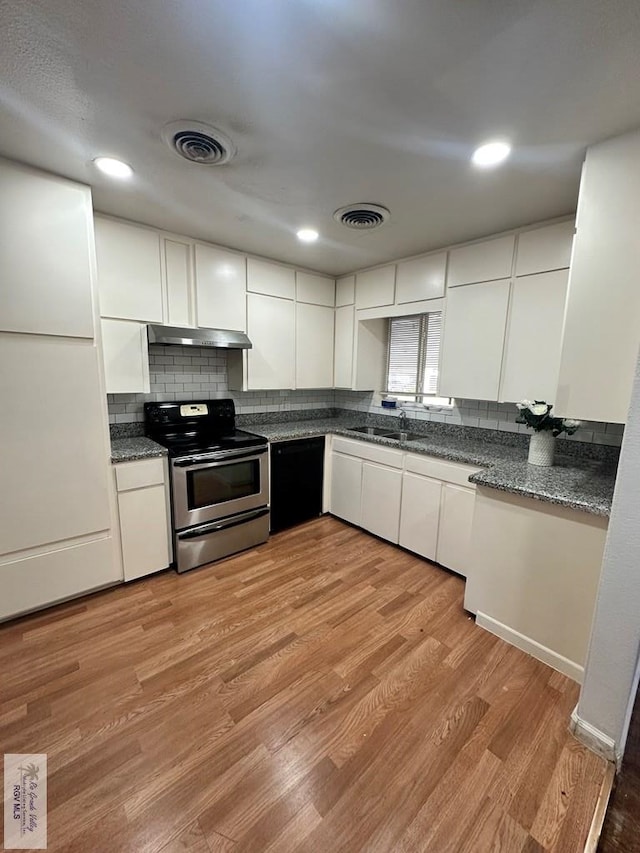 kitchen with stainless steel electric range, dishwasher, white cabinetry, and light hardwood / wood-style flooring