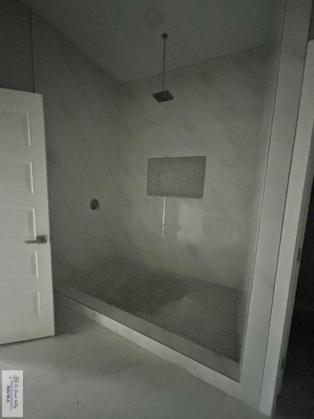 bathroom featuring a shower