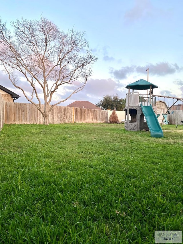 view of yard with a playground