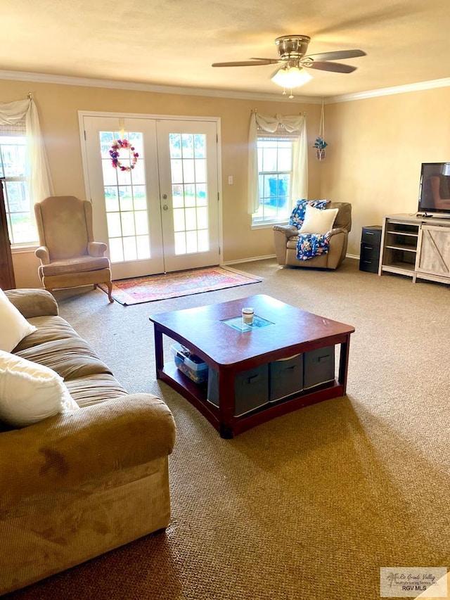 living room featuring ceiling fan, carpet floors, crown molding, and french doors