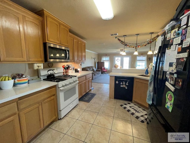 kitchen featuring kitchen peninsula, ceiling fan, decorative light fixtures, light tile patterned flooring, and black appliances