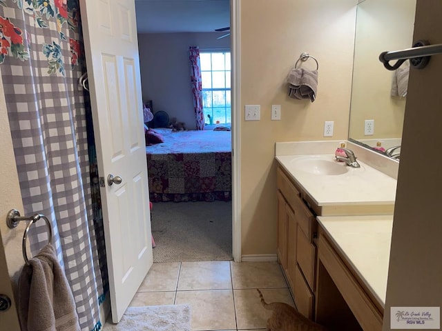 bathroom featuring tile patterned floors and vanity