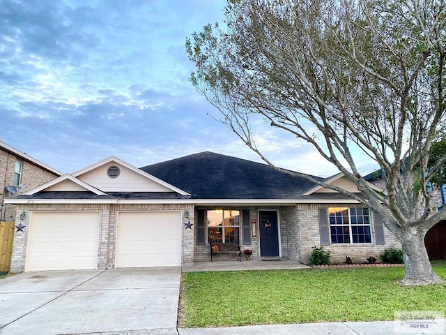 ranch-style house with a front lawn and a garage