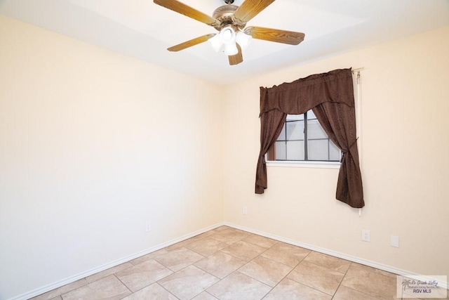 unfurnished room with light tile patterned floors and ceiling fan