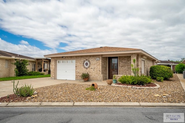 single story home featuring a garage