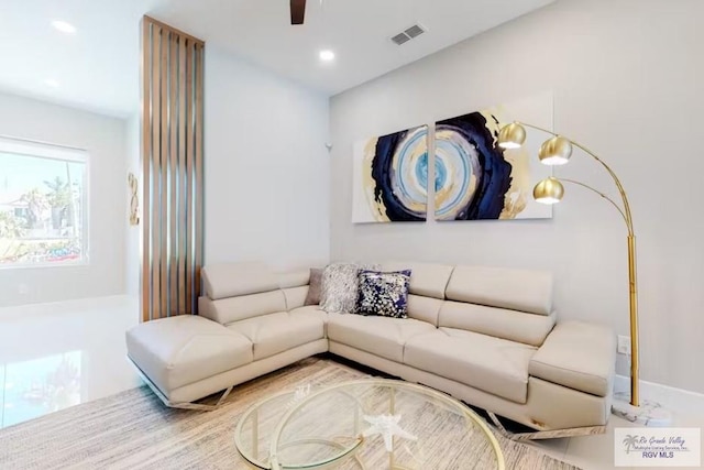 living area featuring recessed lighting, ceiling fan, and visible vents