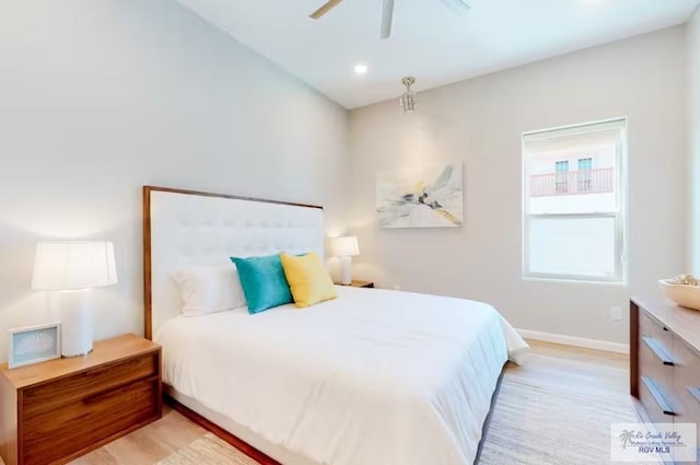 bedroom featuring recessed lighting, baseboards, ceiling fan, and light wood finished floors