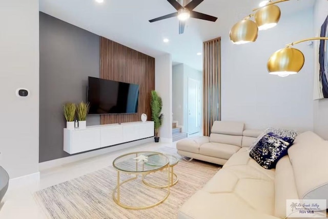 living room featuring ceiling fan and recessed lighting
