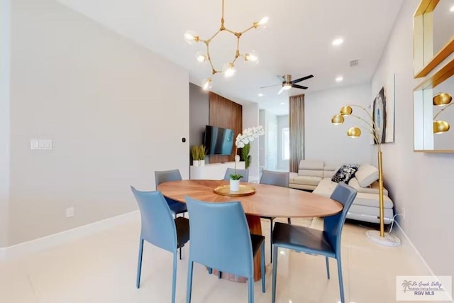 dining space featuring baseboards, ceiling fan with notable chandelier, recessed lighting, and visible vents