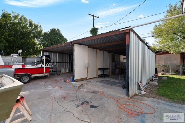 exterior space with a carport