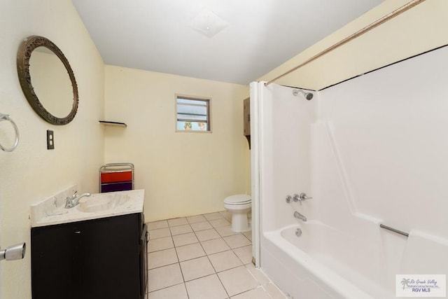 full bathroom featuring tile patterned floors, vanity, toilet, and bathing tub / shower combination