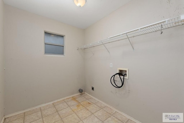 washroom with washer hookup and hookup for an electric dryer