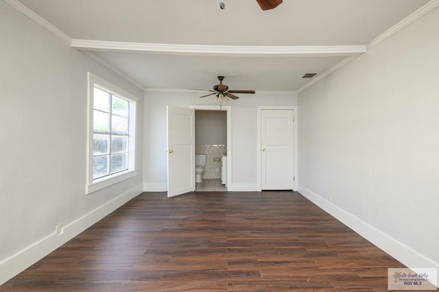718 Pierce Ave, Harlingen, TX 78550 - empty room featuring ceiling fan, ornamental molding, and dark wood finished floors