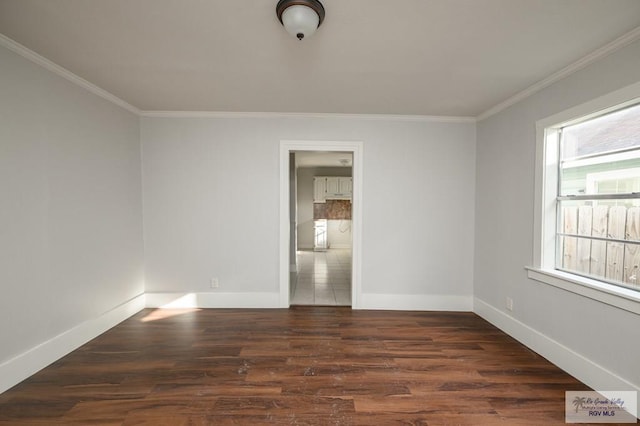 718 Pierce Ave, Harlingen, TX 78550 - spare room with ornamental molding and wood finished floors