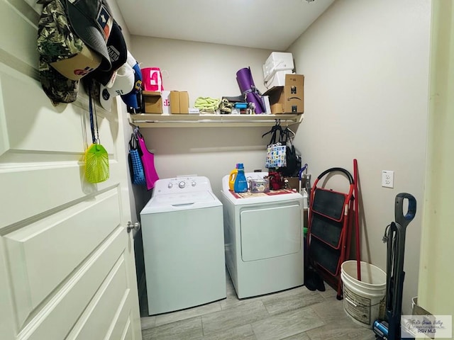 laundry area featuring washer and clothes dryer