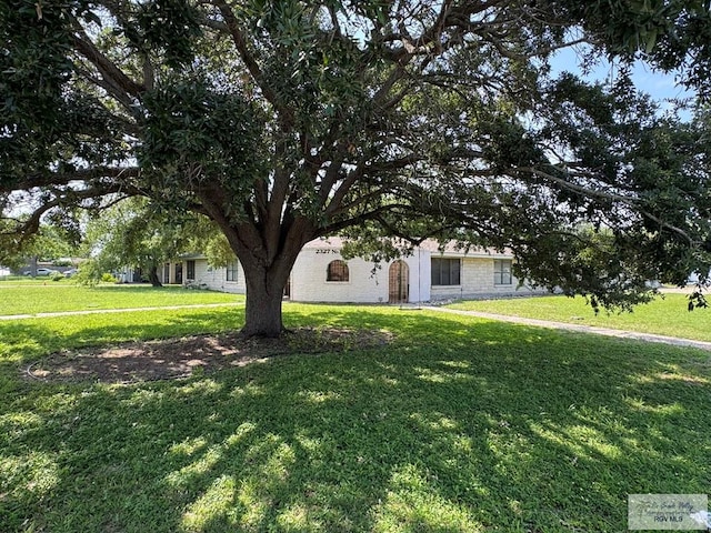 view of front of home with a front lawn