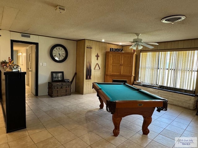 playroom with light tile patterned flooring, ceiling fan, a textured ceiling, billiards, and visible vents
