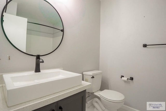 7549 Laurel Ave, Brownsville, TX 78526 - bathroom with vanity and marble look tile flooring