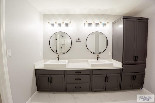 7549 Laurel Ave, Brownsville, TX 78526 - bathroom with marble finish flooring and double vanity