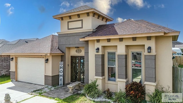 view of front of property with a garage