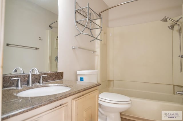 bathroom featuring shower / tub combination, vanity, and toilet