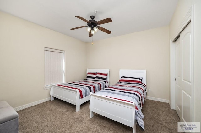 bedroom with carpet flooring, ceiling fan, and a closet