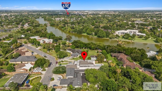 47 Medical St, Brownsville, TX 78520 - aerial view of property's location with a large body of water and a tree filled landscape