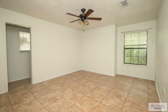 spare room featuring ceiling fan