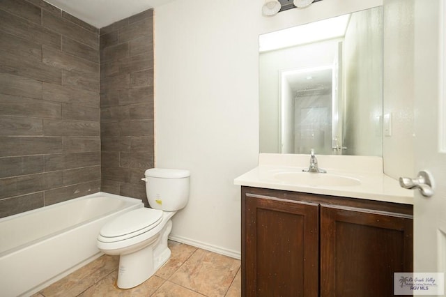 full bathroom featuring tiled shower / bath, tile patterned flooring, vanity, and toilet