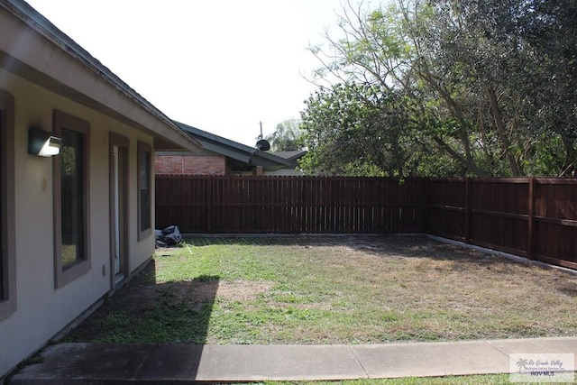 view of yard featuring a fenced backyard