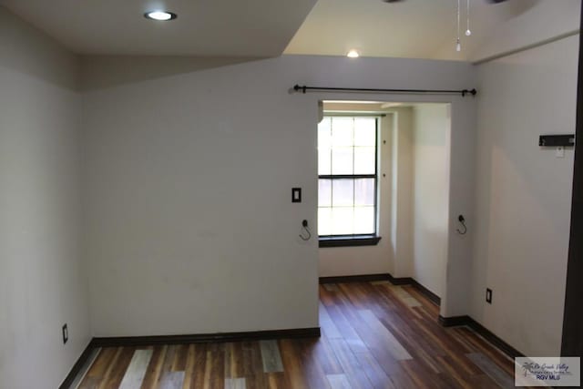 unfurnished room with recessed lighting, baseboards, and wood finished floors