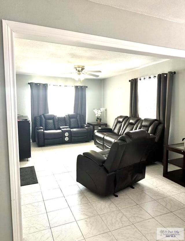 living room featuring ceiling fan