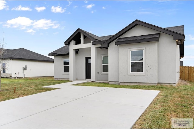 view of front of home with a front yard