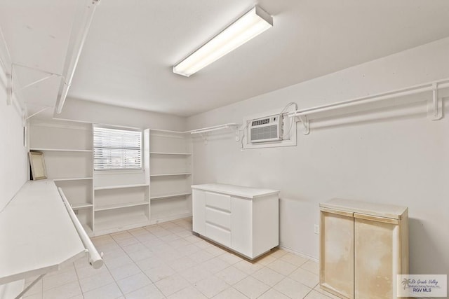 9 Sunshine Pl, Brownsville, TX 78526 - walk in closet featuring an AC wall unit and light tile patterned flooring