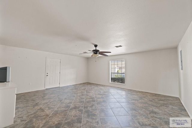 spare room featuring ceiling fan