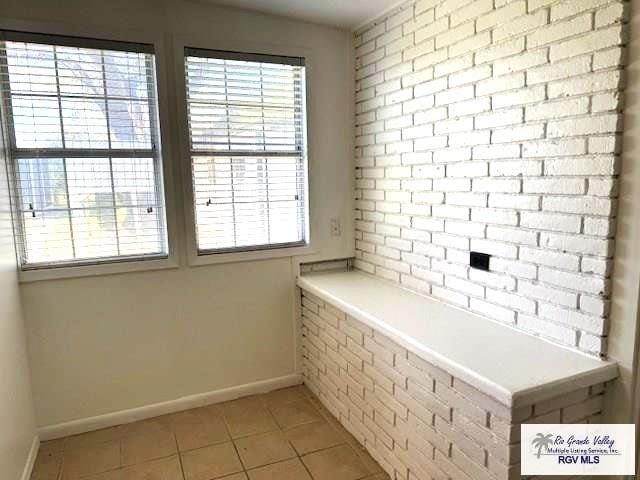 interior space with tile patterned flooring