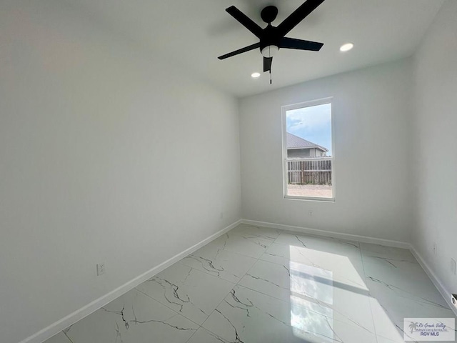 spare room featuring ceiling fan