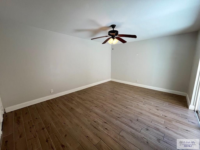 unfurnished room with ceiling fan and light wood-type flooring