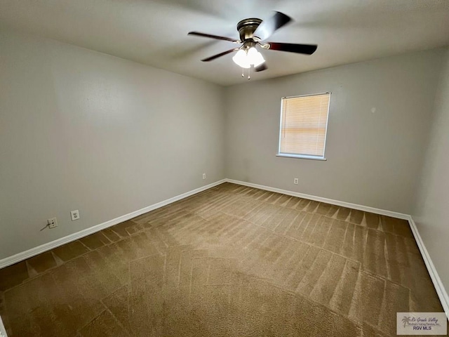 carpeted empty room with ceiling fan